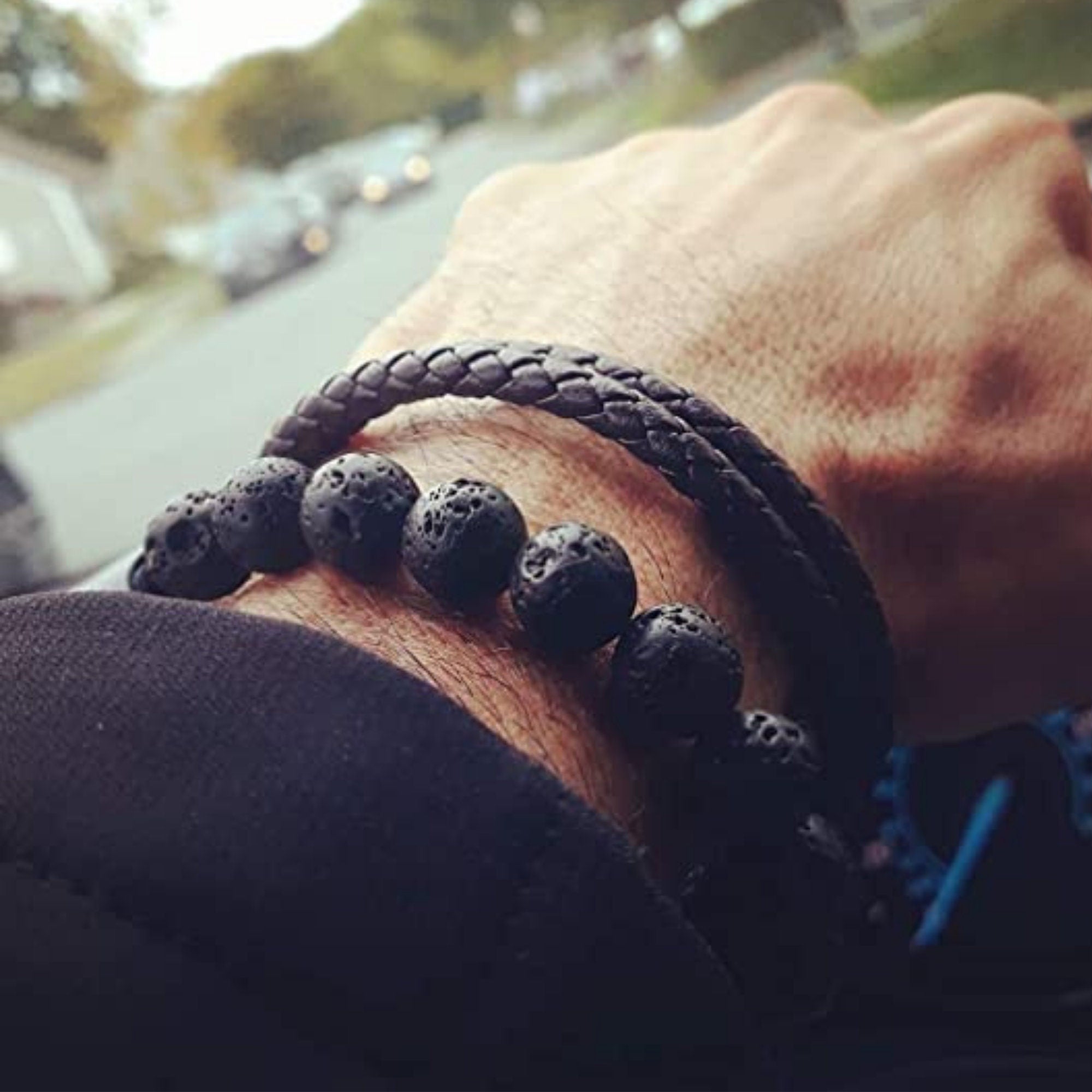 black lava bracelt on the hand